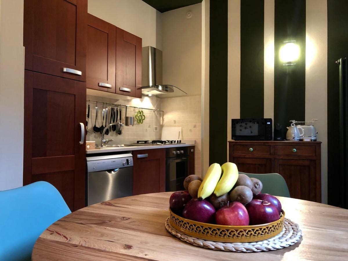 La Via Degli Artisti Apartment อาโรนา ภายนอก รูปภาพ